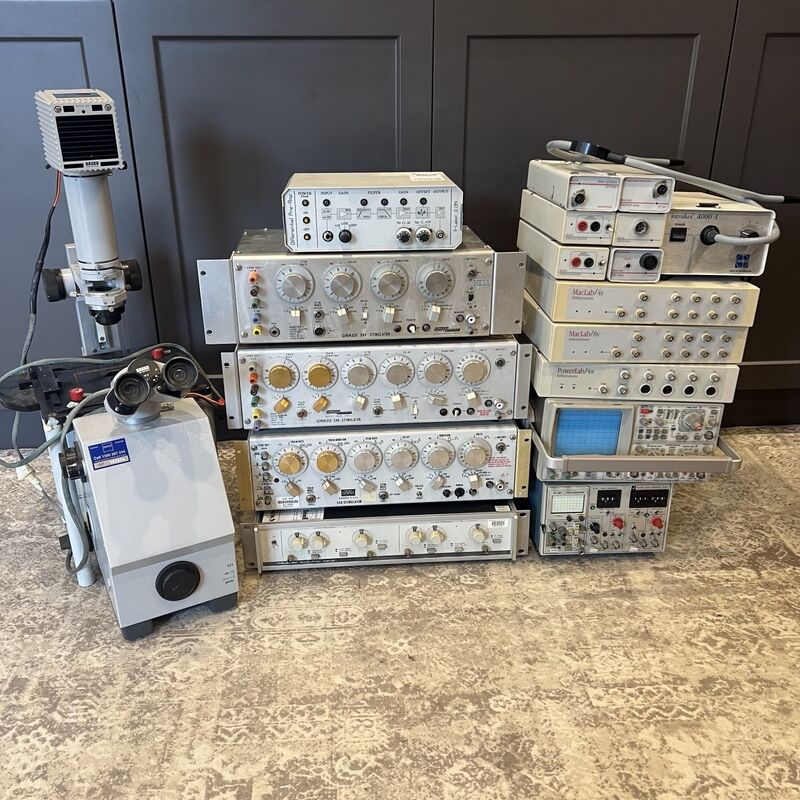 A recovered microscope, Grass stimulators, MacLab and PowerLab amplifiers and an oscilloscope